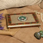Silver embossed paata with metal legs