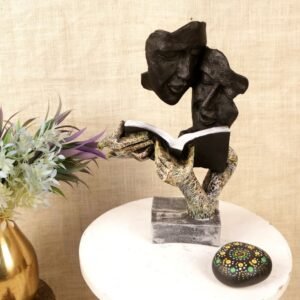Intricate Couple Reading Statue