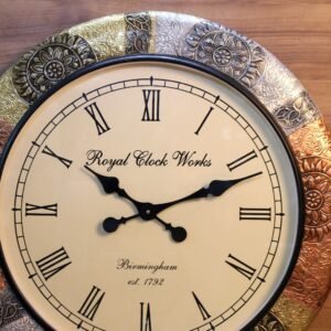 Metal Wall Clock with Intricate Designs