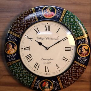 Metal Wall Clock with Intricate Designs
