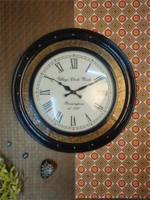 Black and Gold Wall Clock with Intricate Designs