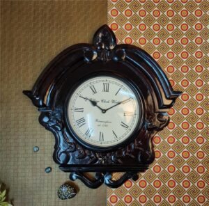 Antique Wooden Wall Clock with Intricate Carvings