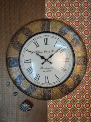 Brass Wall Clock with Intricate Designs